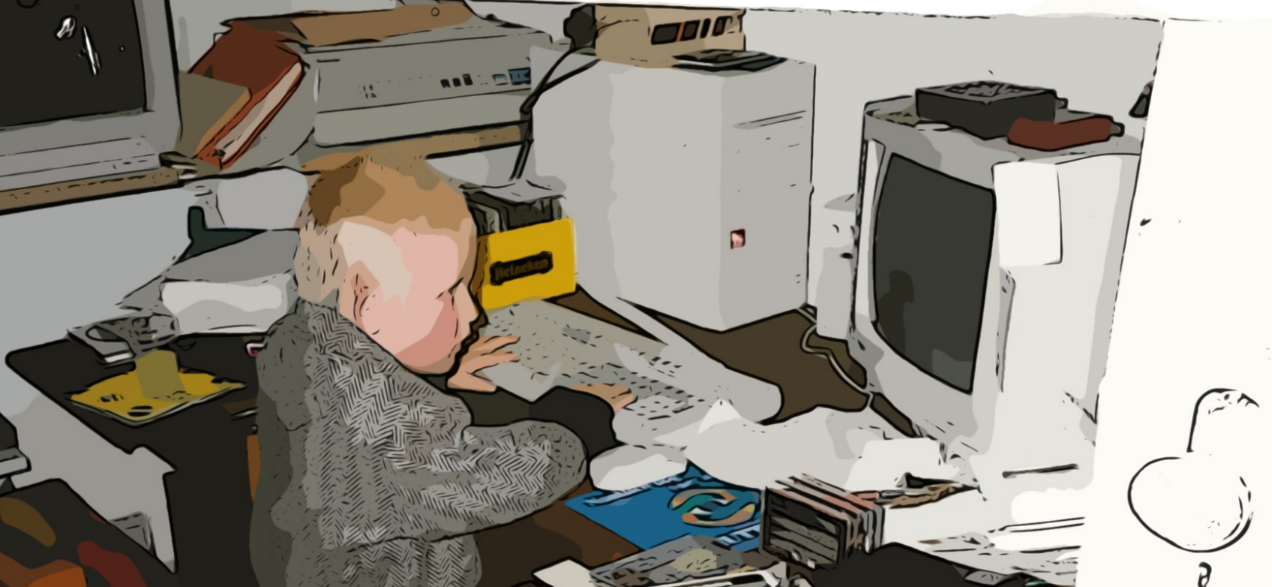 Björn, 1997, six years old, typing on a beige PC tower
